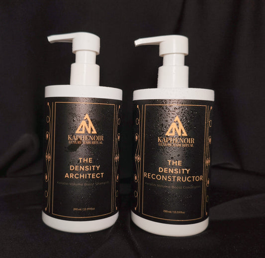 KapheNoir Density Architect shampoo and Density Reconstructor conditioner bottles on black fabric backdrop