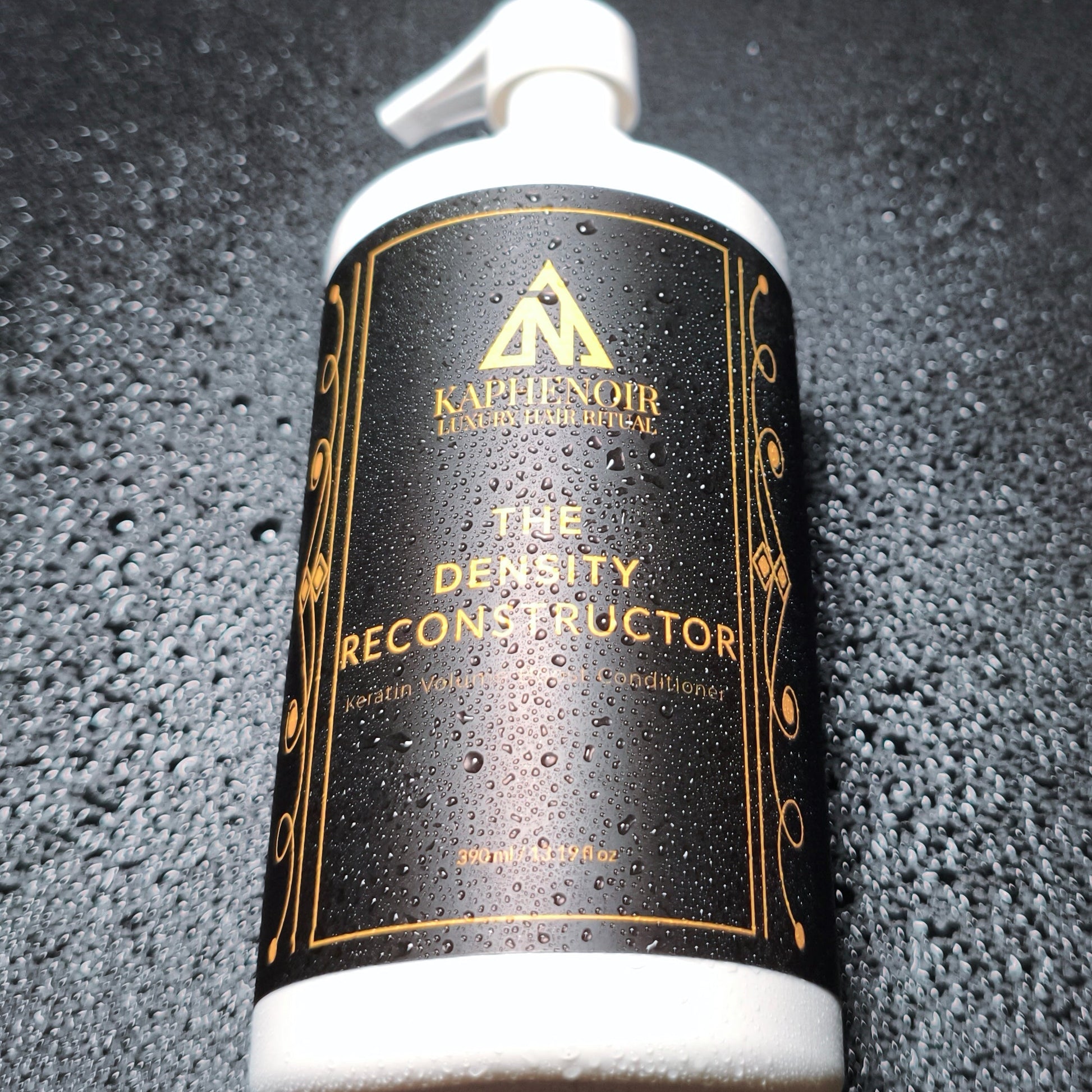 KapheNoir conditioner bottle on a textured black surface